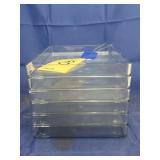 Stack of Clear Plastic Trays