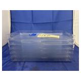 Stack of Clear Plastic Trays