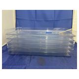 Stack of Clear Plastic Trays