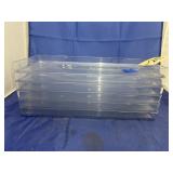 Stack of Clear Plastic Trays