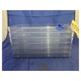 Stack of Clear Plastic Trays