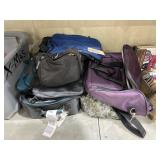 Pile of Assorted Duffle Bags