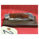 Wood Handled Folding Knife on Stand