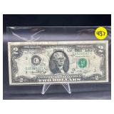 2 DOLLARS NOTE WITH 1976 POST OFFICE STAMP
