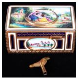 Antique bronze & enameled singing bird music box