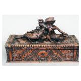 Antique carved walnut figural carved top hinged