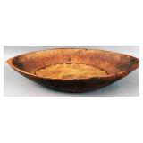 A very good large antique carved wooden butter