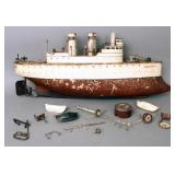 Antique painted tin toy ship marked ?Olympia?