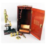 Antique brass microscope & case marked for