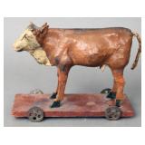 Antique cow pull toy