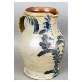 Antique decorated stoneware water pitcher