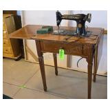 Singer Sewing Machine in Cabinet