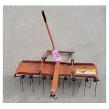 Tow Behind Dethatcher