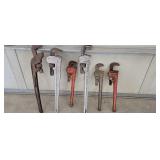Six Large Pipe Wrenches