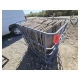 Tote Cage Full of 59 Folding Chairs