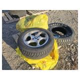 4 - Studded Tires + 1-- Tire