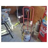 Propane tank and weed torch on bag cart