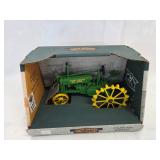 JD B Tractor on steel