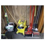 Assorted mops, brooms, mop bucket
