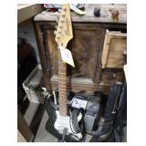 Fender Starcaster electric guitar and amp