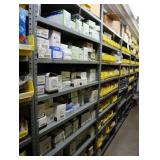 Contents of the shelving unit, assorted switches,