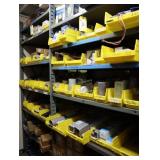 Contents of the shelving unit, assorted timers,