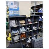 Metal parts bin with assorted chalking, silicone,