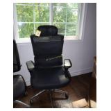 Black fabric ergonomic roller chair