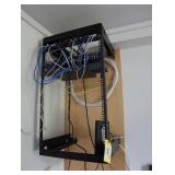 Wall mounted computer rack with Netgear & TP Link