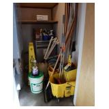 Contents of the cleaning closet, mops, mop