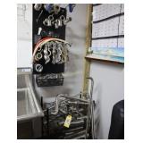 Assorted stainless steel piping, clamps, fittings