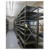 Sections of clip style metal shelving 24 x 36