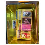 TIN OF POKEMON CARDS
