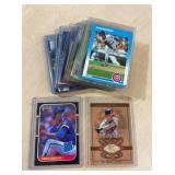 21 GREG MADDUX CARDS INCL ROOKIES AND BAT RELIC