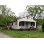 HOME & 1+/- ACRE LOT