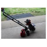 Troy Built 2 cycle tiller w/gas oil can