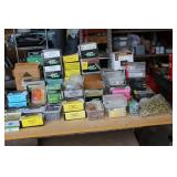 several boxes of screws