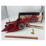 Farmall 560 with 2-MH Corn Picker Precision