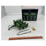 John Deere The Model 494-A Four Row Plow,