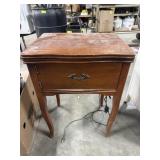 Sewing machine cabinet