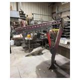 Swing arm bolt down hoist