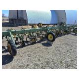 John Deere 12 row cultivator with roll shields
