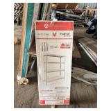 Metal garage shelf New in box