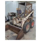 Clark 610 bobcat skidloader runs drives bucket