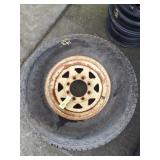 LT235/85R16 Tire and 8 bolt rim