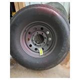 Firestone LT235/85R1 trailer tire with 8 bolt rim