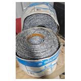 Barbed Wire Rolls and Fence Post Driver