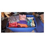 Assorted Apparel in Storage Container