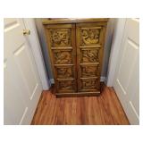 Carved Bird Motif Cabinet
