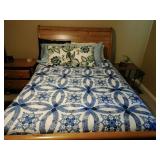 Blue and White Patterned Quilt